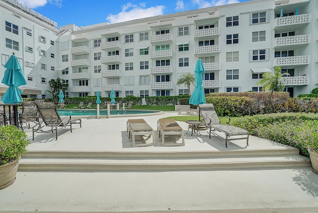 view of property's community featuring a pool