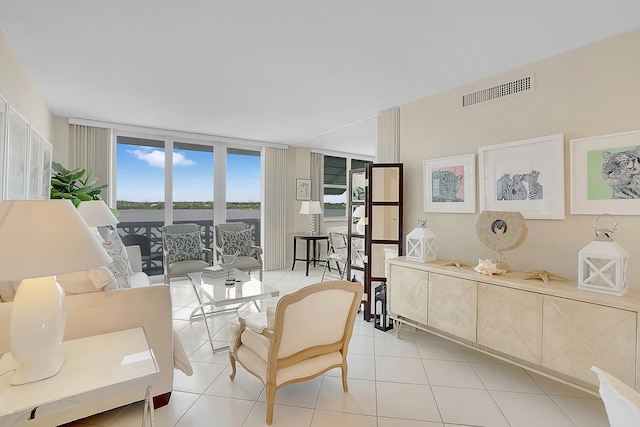 tiled living room with expansive windows