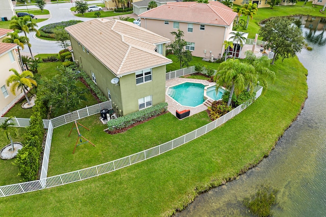 bird's eye view with a water view