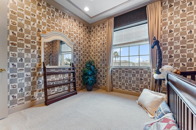 interior space with plenty of natural light, carpet, and ornamental molding