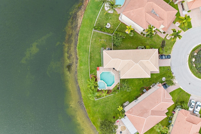 drone / aerial view with a water view