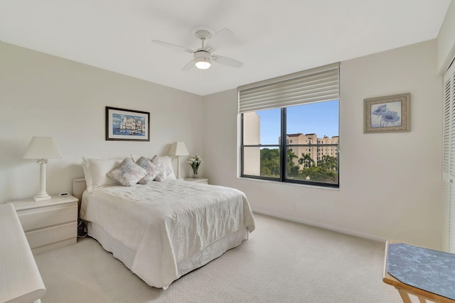7567 Imperial Dr Unit 601, Boca Raton, FL 33433 - bedroom featuring light colored carpet, baseboards, and ceiling fan