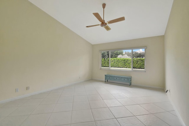 unfurnished living room with light tile patterned flooring, high vaulted ceiling, and ceiling fan