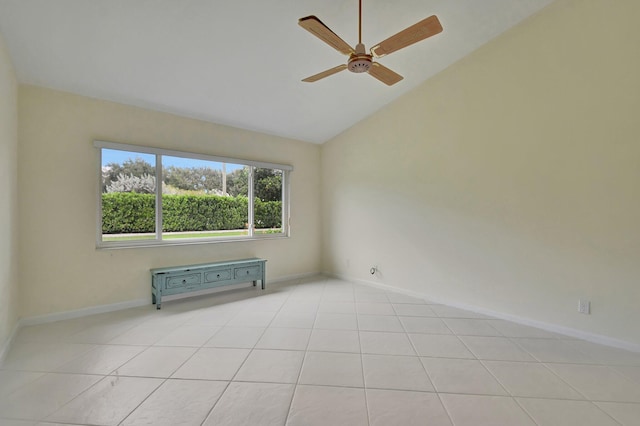 tiled empty room featuring high vaulted ceiling and ceiling fan