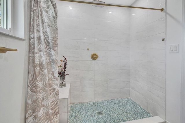 bathroom featuring curtained shower