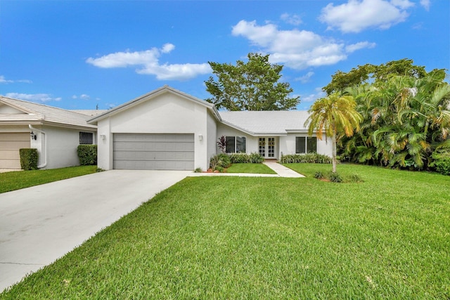 single story home featuring a front yard and a garage