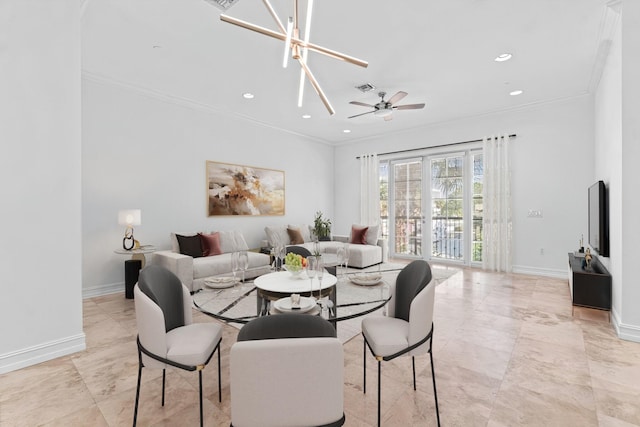 dining area with ceiling fan with notable chandelier and crown molding