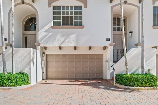 view of front of property with a garage