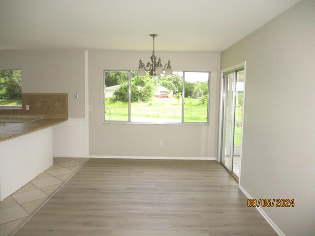 bathroom featuring toilet, vanity, tile patterned floors, and walk in shower