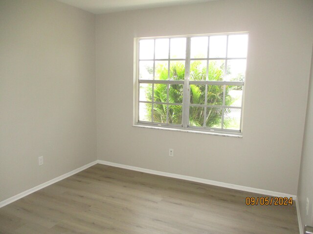 utility room with water heater