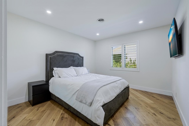 bedroom featuring light hardwood / wood-style floors