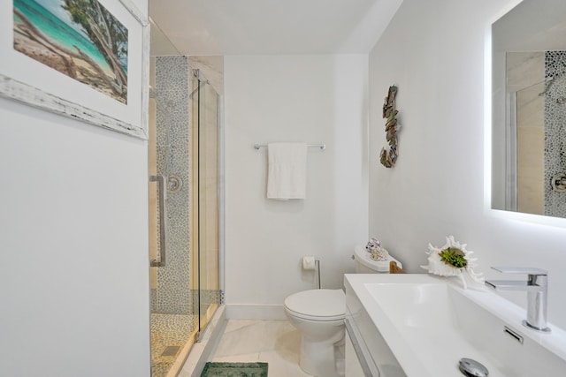 bathroom with tile patterned flooring, toilet, sink, and walk in shower