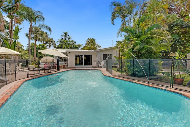 view of swimming pool featuring a patio