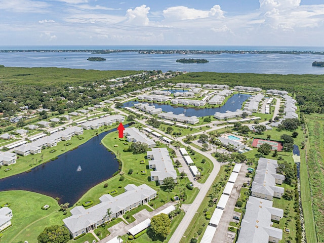 birds eye view of property featuring a water view