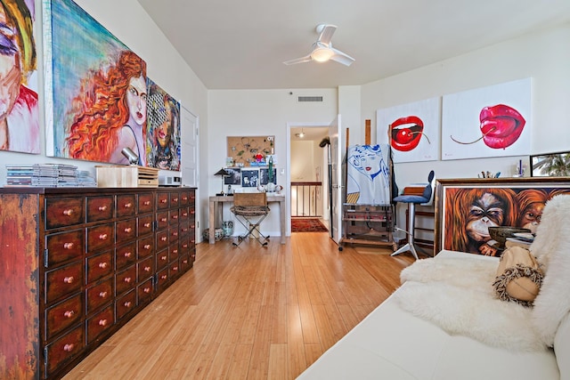 bedroom featuring ceiling fan and light wood-type flooring