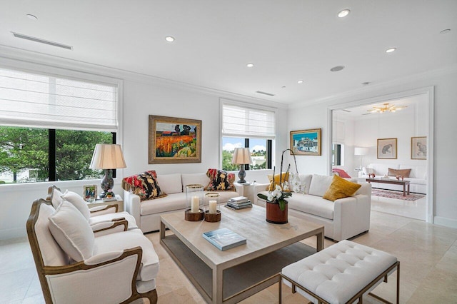 living room featuring crown molding and light tile patterned floors