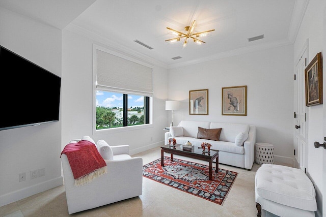 living room featuring crown molding and a chandelier