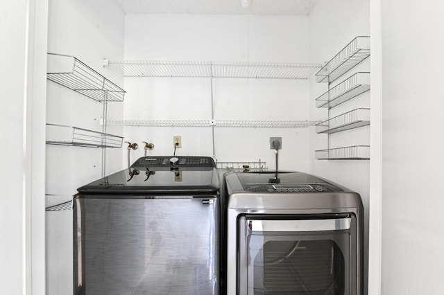 9170 SW 14th St Unit 4107, Boca Raton, FL 33428 - clothes washing area with washer and dryer and laundry area