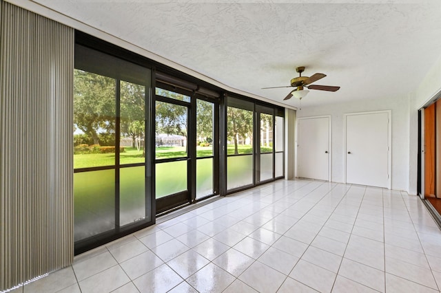 9170 SW 14th St Unit 4107, Boca Raton, FL 33428 - interior space with light tile patterned floors, ceiling fan, a wall of windows, and a wealth of natural light