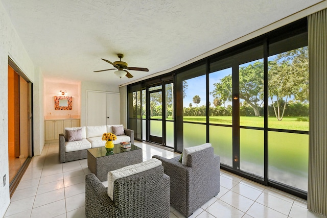 sunroom / solarium with ceiling fan