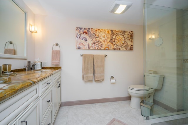 bathroom featuring vanity, toilet, a shower with shower door, and tile patterned flooring