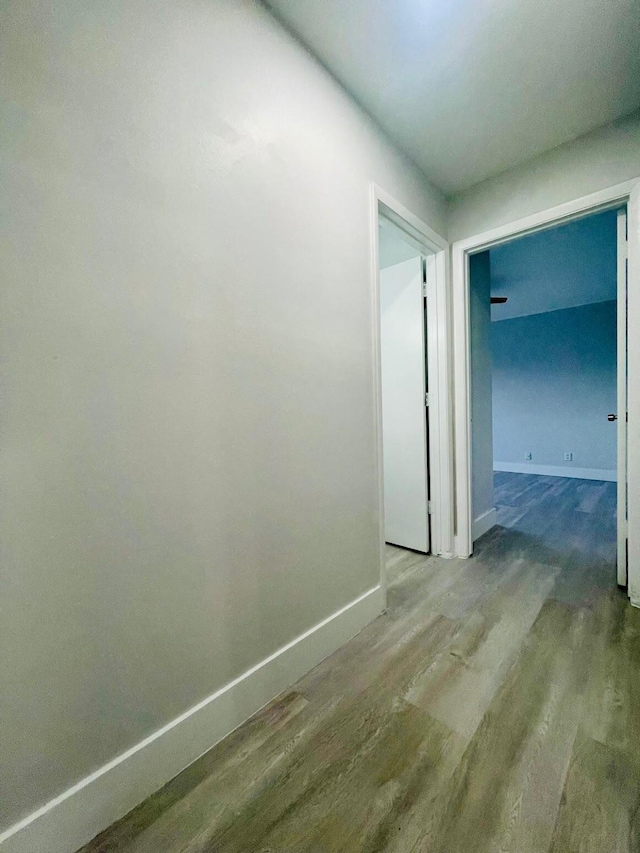 hallway featuring hardwood / wood-style floors