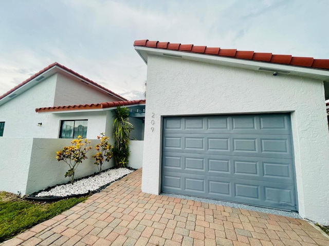 exterior space with a garage