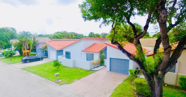 view of front of home featuring a garage