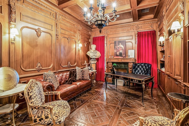 living area with coffered ceiling, a chandelier, dark parquet floors, and wood walls