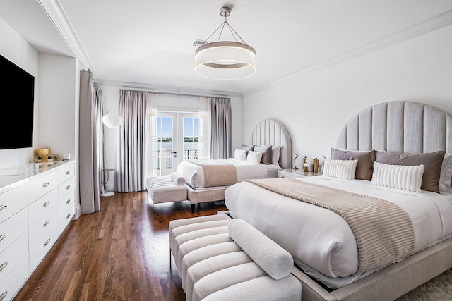 bedroom with access to exterior, ornamental molding, dark hardwood / wood-style floors, and french doors