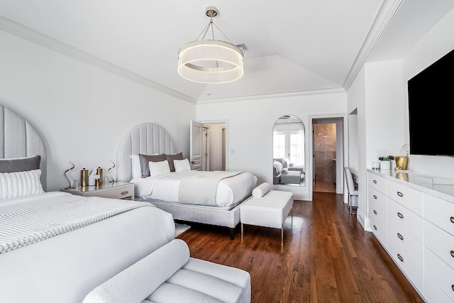 bedroom with vaulted ceiling, crown molding, and dark hardwood / wood-style flooring