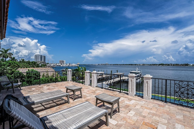 view of patio featuring a water view