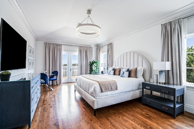 bedroom with vaulted ceiling, dark hardwood / wood-style floors, access to exterior, crown molding, and french doors