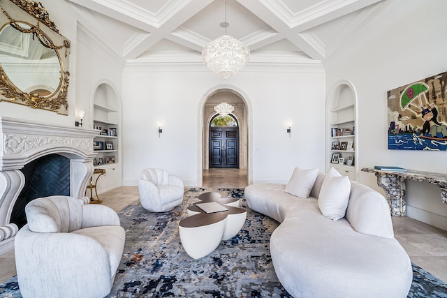 living room featuring coffered ceiling, built in features, beamed ceiling, and an inviting chandelier