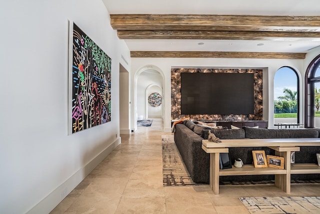 interior space featuring beamed ceiling