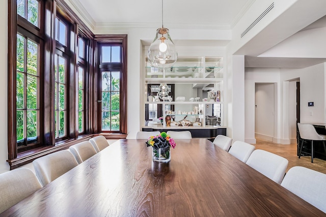 dining room with ornamental molding