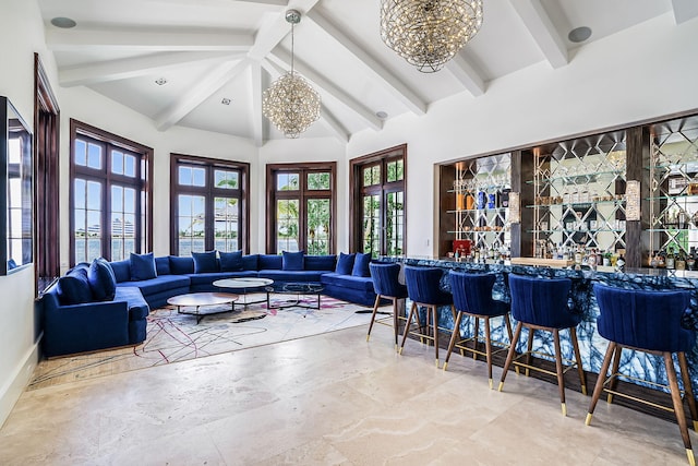 living room with an inviting chandelier, beam ceiling, high vaulted ceiling, and bar