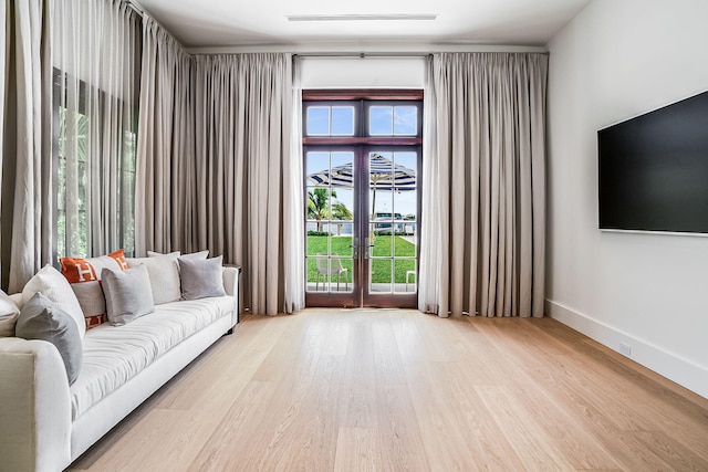 unfurnished living room featuring light wood-type flooring