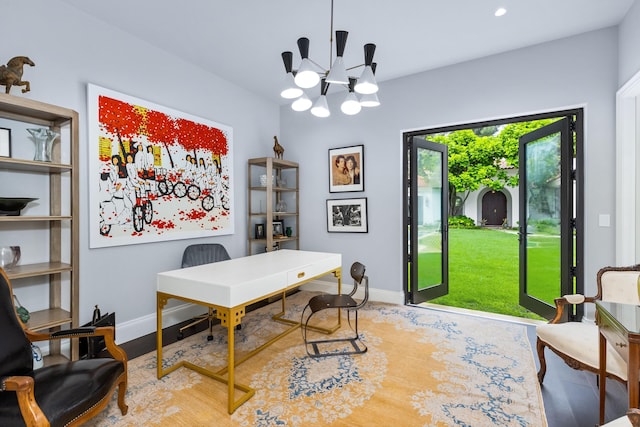 home office featuring a chandelier