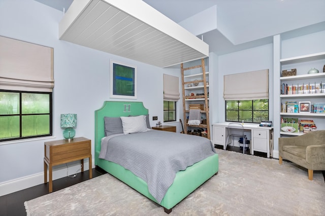 bedroom featuring hardwood / wood-style floors