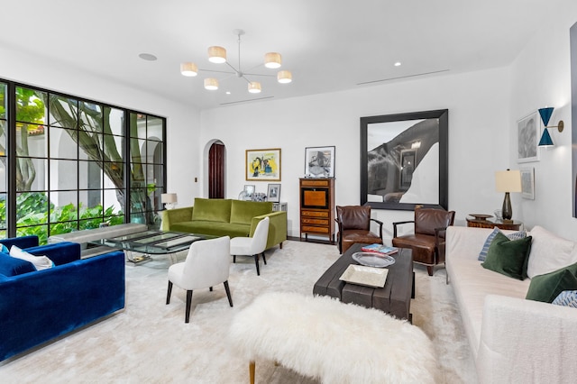 living room with an inviting chandelier