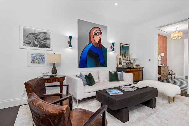 living room featuring an inviting chandelier