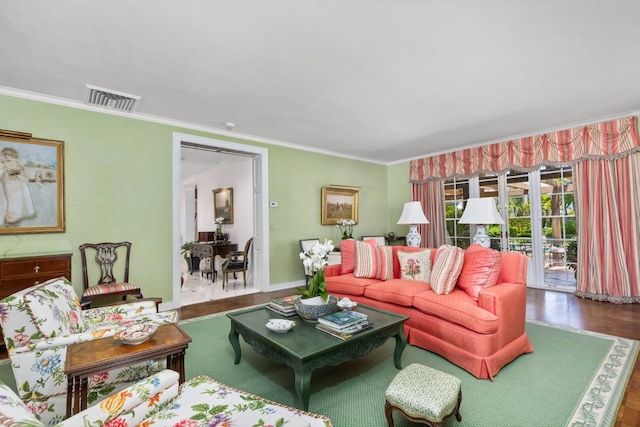 living room featuring dark hardwood / wood-style floors and ornamental molding