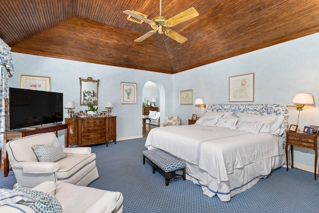 carpeted bedroom with vaulted ceiling, ceiling fan, and wooden ceiling