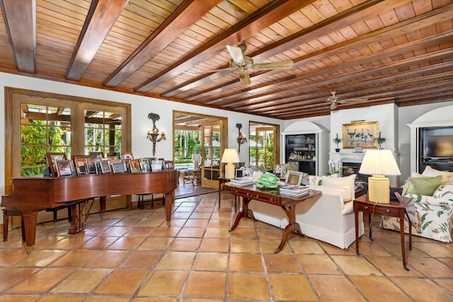 living room with ceiling fan, beam ceiling, and wooden ceiling