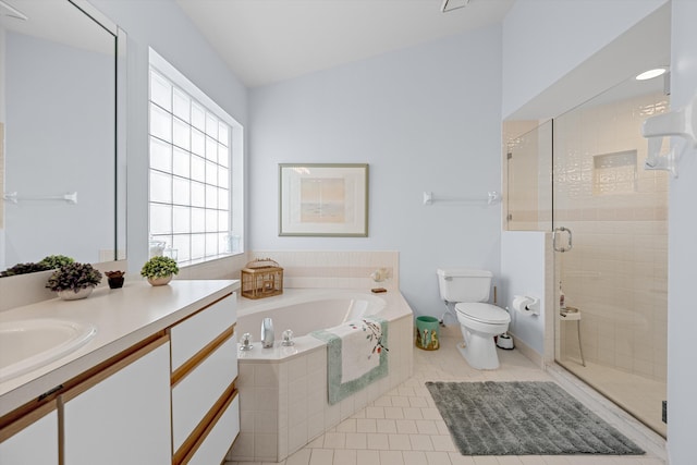 full bathroom featuring separate shower and tub, tile patterned floors, vaulted ceiling, toilet, and vanity