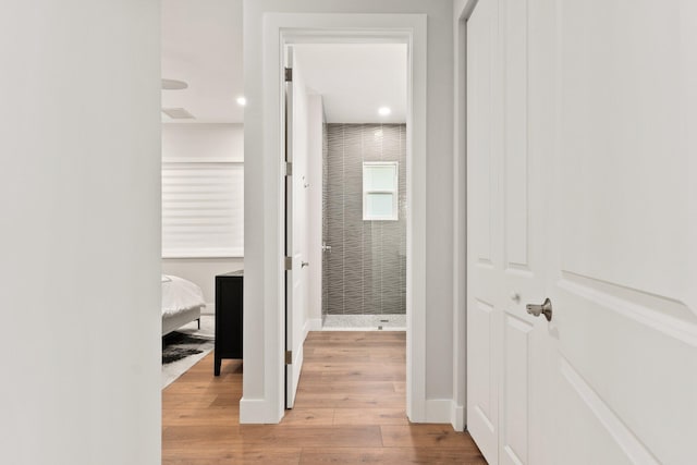 hallway featuring light hardwood / wood-style flooring