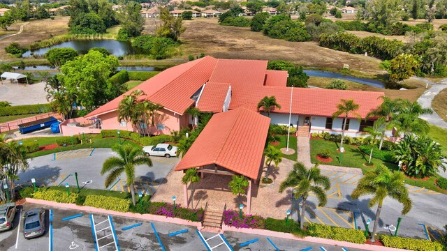 bird's eye view with a water view