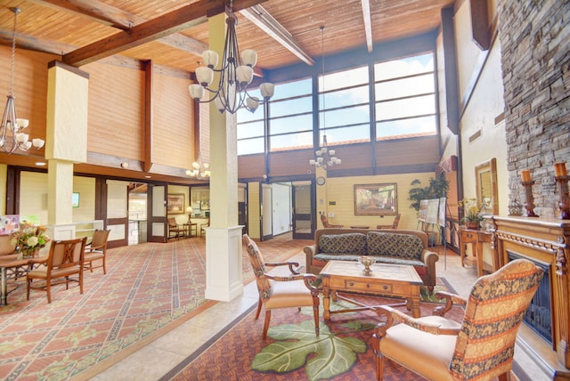 living room featuring tile patterned floors, an inviting chandelier, wooden ceiling, and a towering ceiling