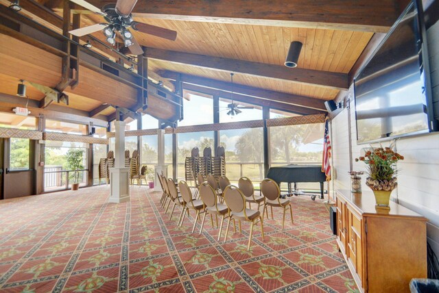 sunroom / solarium with wood ceiling, ceiling fan, and vaulted ceiling with beams